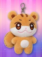 Une peluche porte-clés JJOONGrami ANITEEZ représentant un adorable petit animal orange et blanc, avec une tête ronde, de grandes oreilles et un mousqueton argenté, sur un fond rose et violet scintillant.